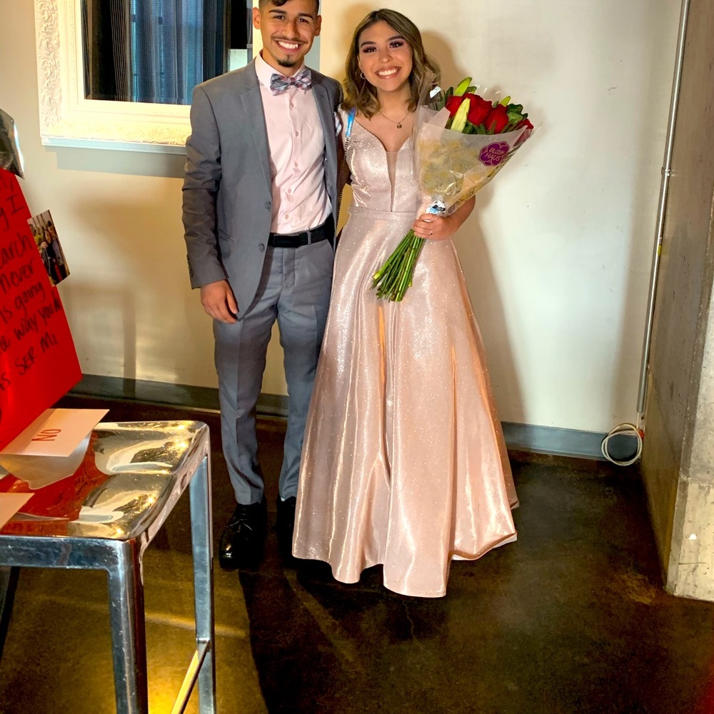 Cinderella divine. Prom dress worn only once  the dress have 2 pockets